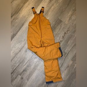Columbia Snow bib. Size Med boys Burnt brown orange colored. Used only once